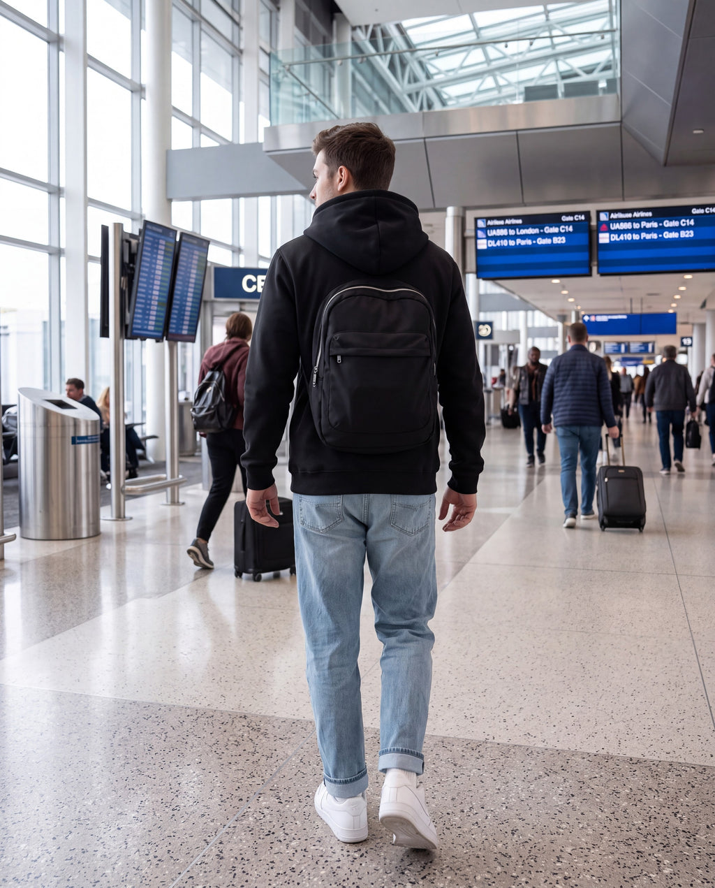 Black PackHoodie worn at the airport