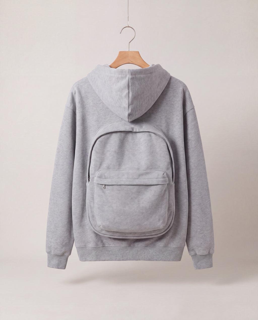 PackHoodie in Gray, back view with built-in backpack pouch